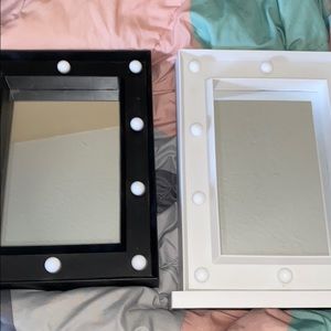 A set of mirrors with lights that work !!